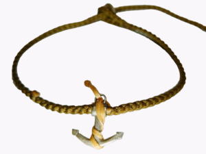 thick cord bracelet/anklet on khaki with ⚓ and yellow beige catching.