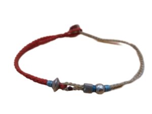 1750540165244_pixian_ai double thin cord bracelet/anklet on red and cream with three geometric beads.