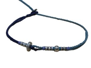double thin cord bracelet/anklet on dark denim and cyan with five geometric beads.