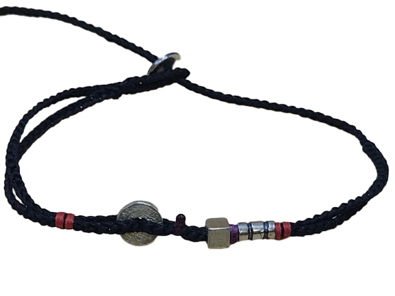 double thin cord bracelet anklet on black and black with three geometric beads.