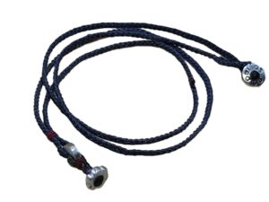 thin cord necklace (multi jewelry) on coal with two geometric beads.