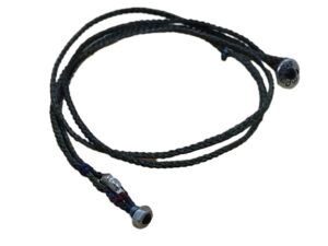 thin cord necklace (multi jewelry) on khaki with two geometric beads.