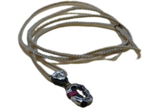 thin cord necklace (multi jewelry) on beige with silver rock & carabiner.