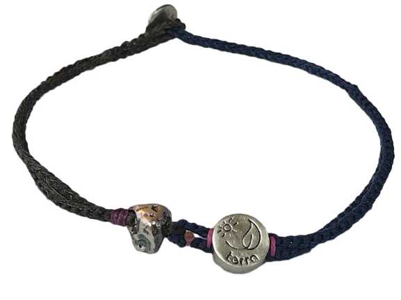 double thin & thick cord bracelet/anklet on khaki and dark denim with rock & "terra".