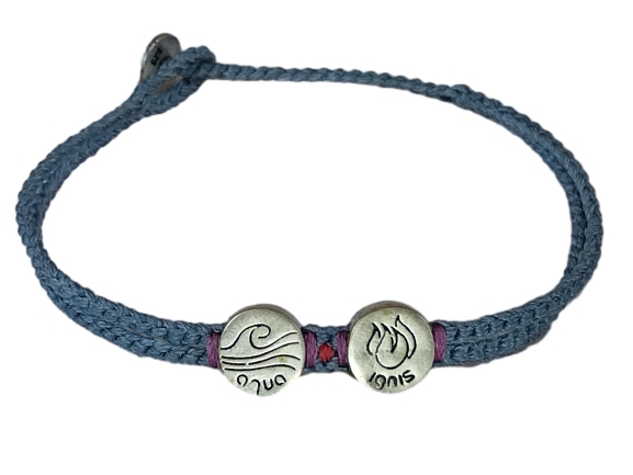double thick cord bracelet/anklet on open denim with "aqua" and "ignis"